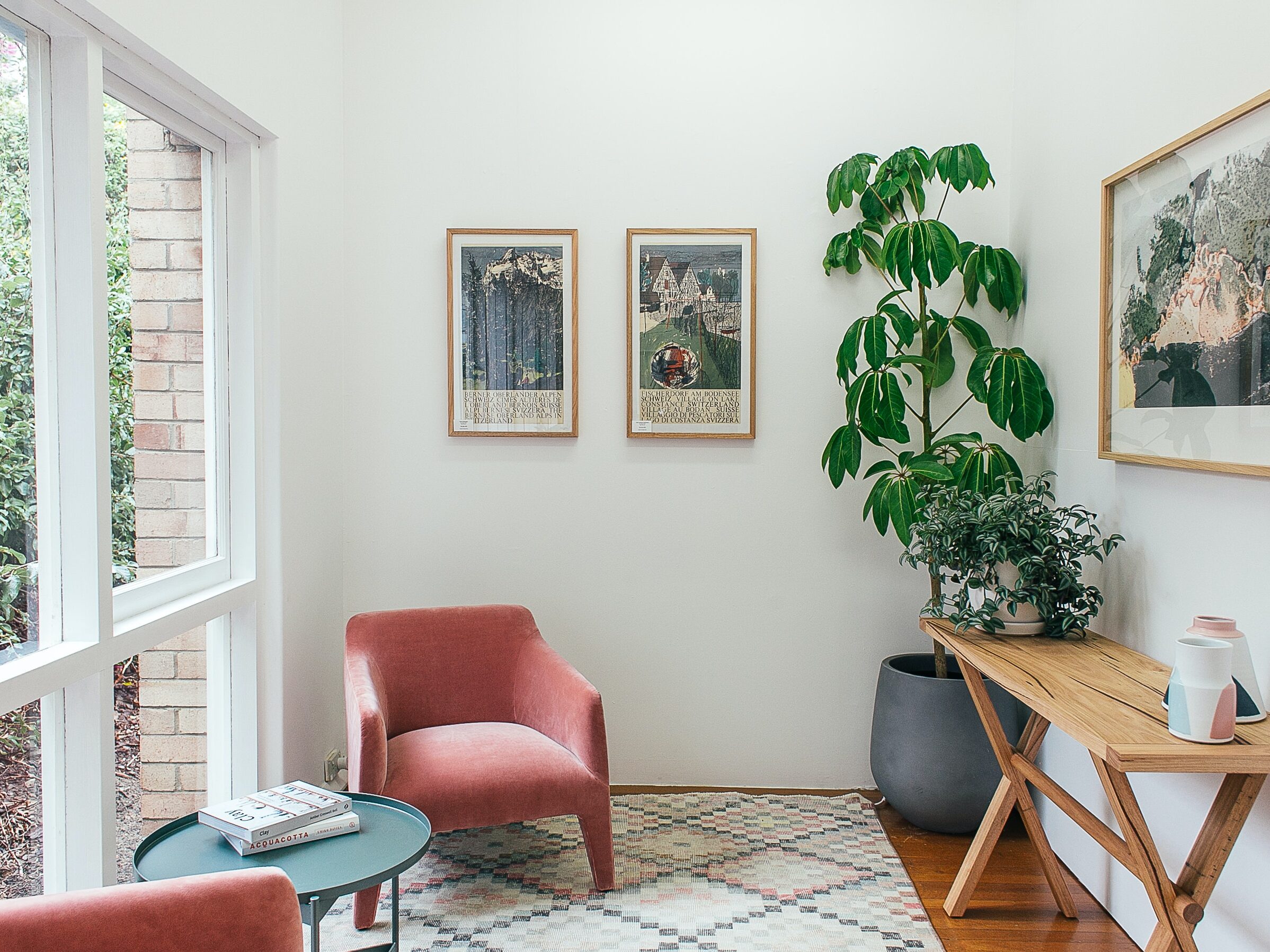 room with large windows and reading chair